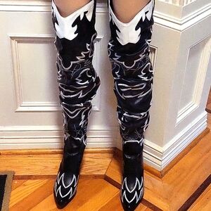 Amazon brand is cape robbin cowboy boots . Its an faux leather feels like vinyl